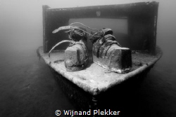 Old school diver shoes on little wreck in Kempervennen La... by Wijnand Plekker 